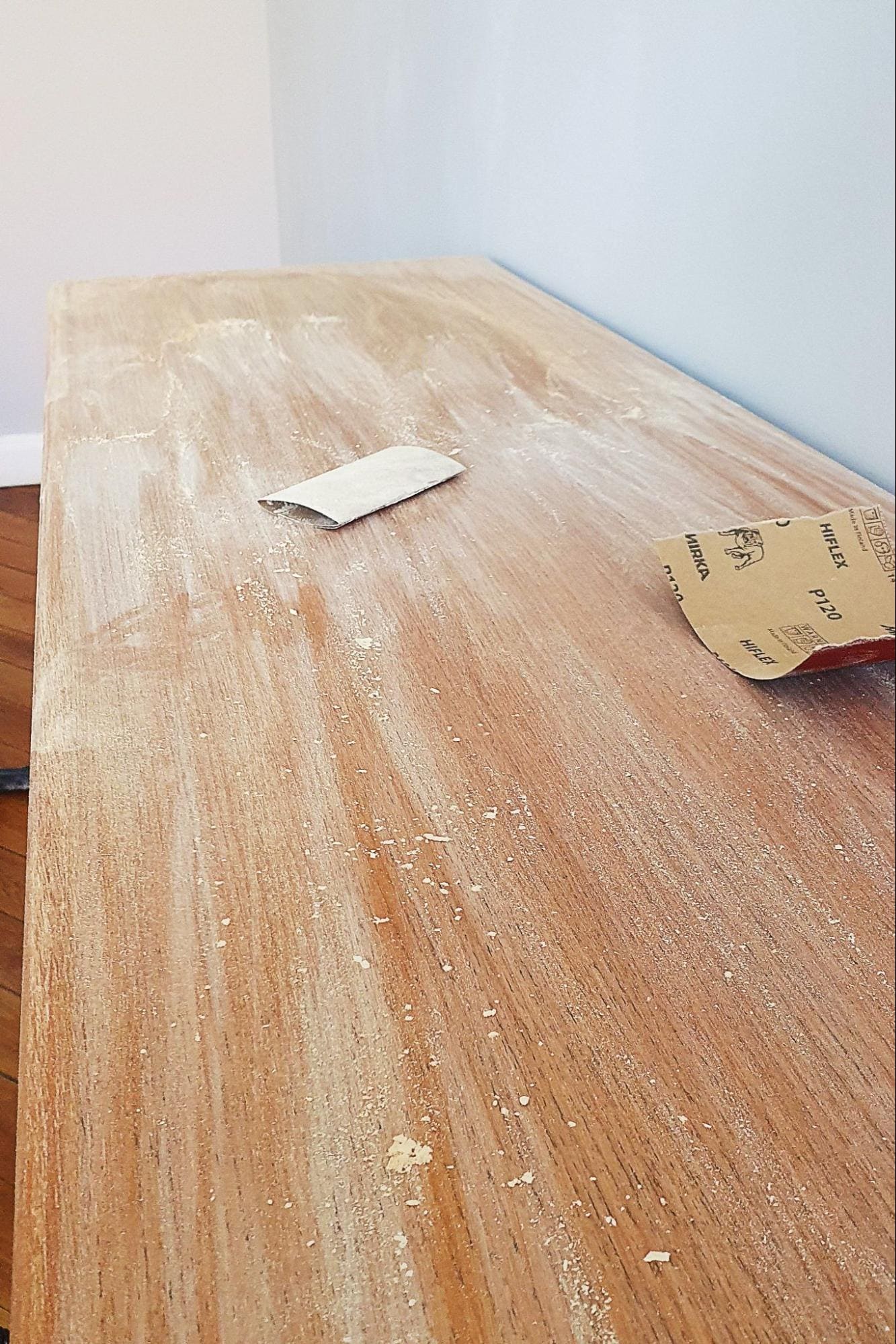 can you paint over stained wood without sanding